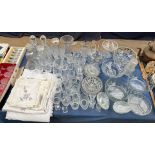 Glass decanters together with assorted drinking glasses, glass bowls,