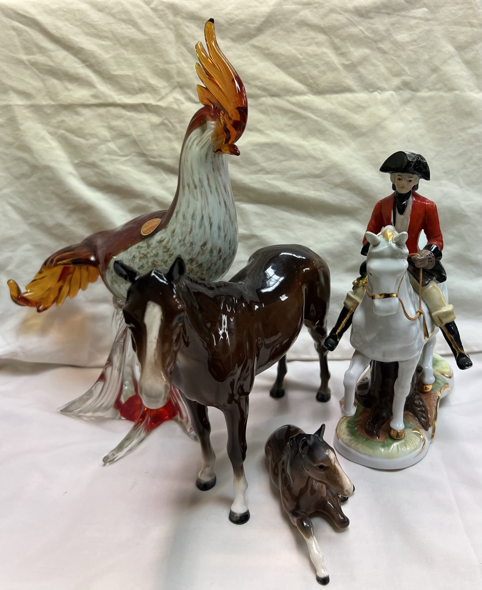 A Murano cockerel together with a Beswick bay horse and foal,
