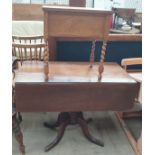 A 19th century mahogany sofa table together with an oak cased sewing table