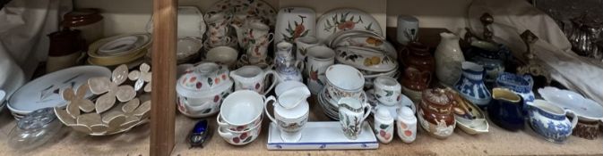 A Belleek porcelain vase together with A Doulton Lambeth jar and cover, various jugs,