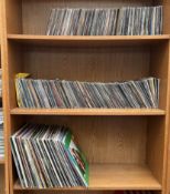 A large collection of LP's and singles including Level 42, Kraftwerk, Chaka Khan, Queen, The Police,