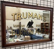 A pub mirror for "Truman's Burton Ales" in an oak frame, 92.