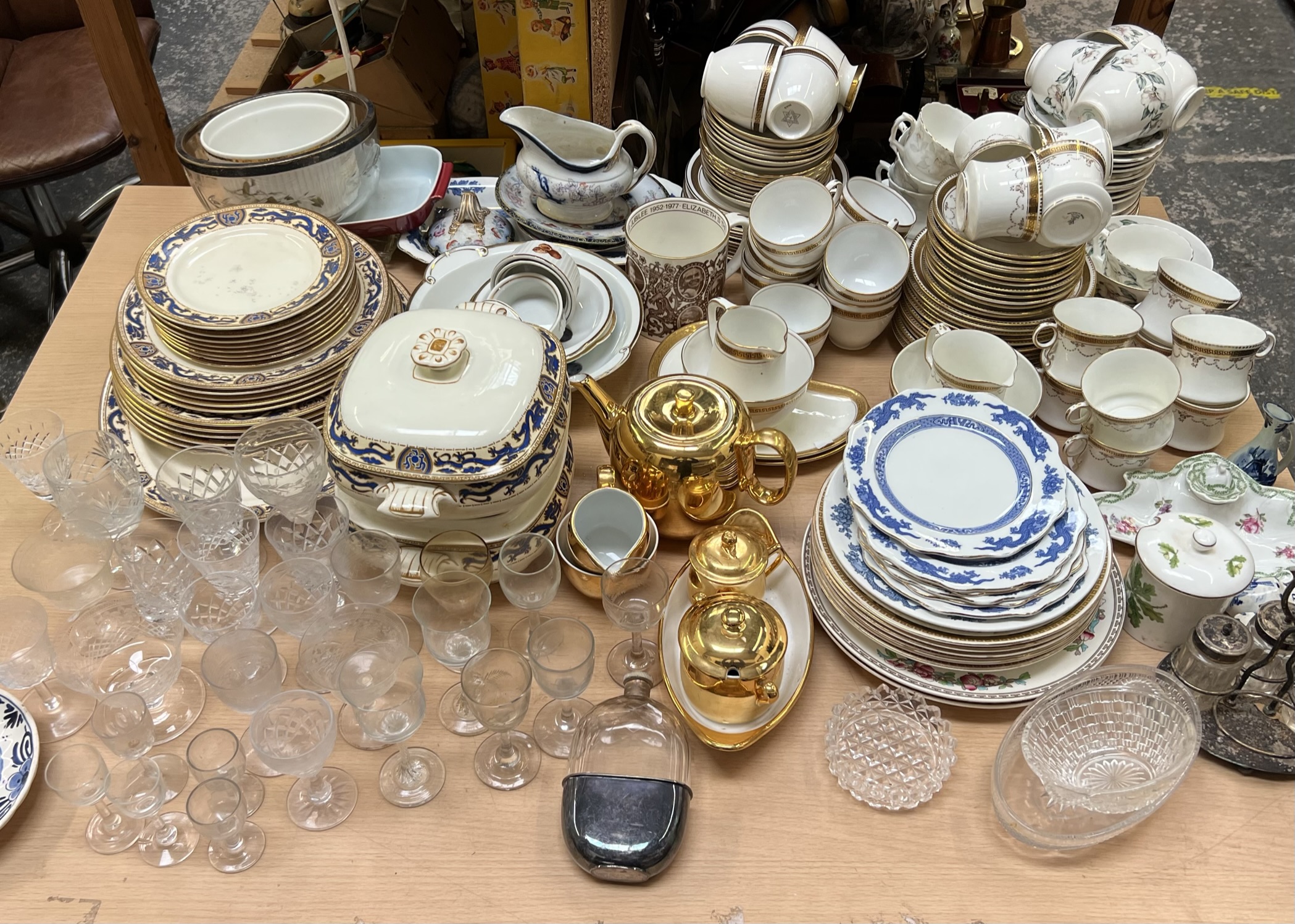 A Booths dragon decorated part dinner service together with a collection of part tea services,