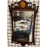 A George III style mahogany wall mirror with fan inlay