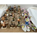 A collection of assorted Hummel figures, together with Royal Adderley floral baskets,