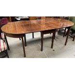 A George III mahogany gateleg dining table together with two D end tables
