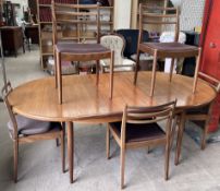 Ernest Gomme - G Plan - A mid 20th Century teak dining suite comprising a set of six dining chairs
