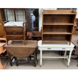 A 20th century oak gateleg dining table together with a piano stool,