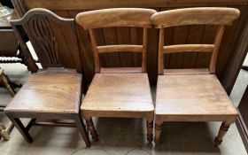 A George III dining chair with a vase shaped splat together with a pair of 19th century dining