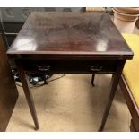 An Edwardian mahogany envelope card table of square form,