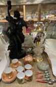 A bronzed figure group of lovers together with a pottery twin handled vase, crystal table lamp,