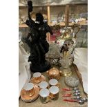 A bronzed figure group of lovers together with a pottery twin handled vase, crystal table lamp,