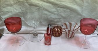 A 19th century wine glass, engraved with roses and swags, initialled "h h",