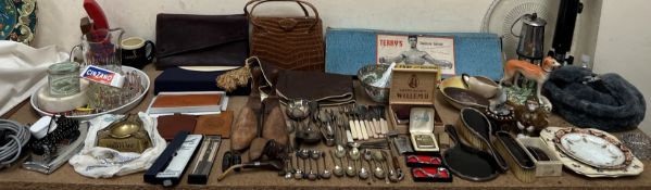 A silver and tortoise shell part dressing table set together with wallets, smoking memorabilia,