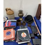 A collection of 45 records together with a brass lamp, copper measures, copper bed warming pan,