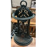 A cast iron stick stand,