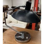 A mid 20th century chrome and black table lamp
