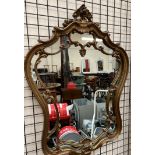 A modern gilt decorated wall mirror