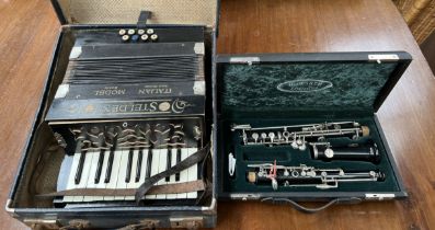 A Boosey and Hawkes oboe together with a Steldeni piano accordion .