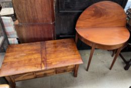 A late 19th century mahogany tea table together with a hardwood trunk / coffee table