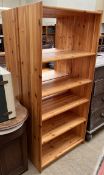 A pair of pine bookcases