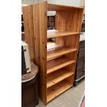 A pair of pine bookcases