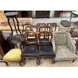 A set of four Victorian balloon back dining chairs together with an upholstered nursing chair,
