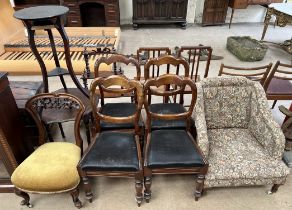 A set of four Victorian balloon back dining chairs together with an upholstered nursing chair,