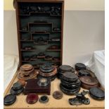 A Chinese hardwood wall mounted display cabinet together with a collection of Oriental carved