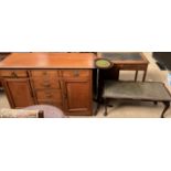 A mahogany sideboard with drawers and cupboards together with a reproduction coffee table and