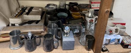 Cribbage boards together with pewter tankards, pottery tankards,