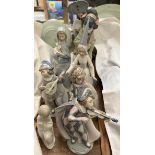 A pair of Lladro figures of Japanese ladies together with five other Lladro figures and another