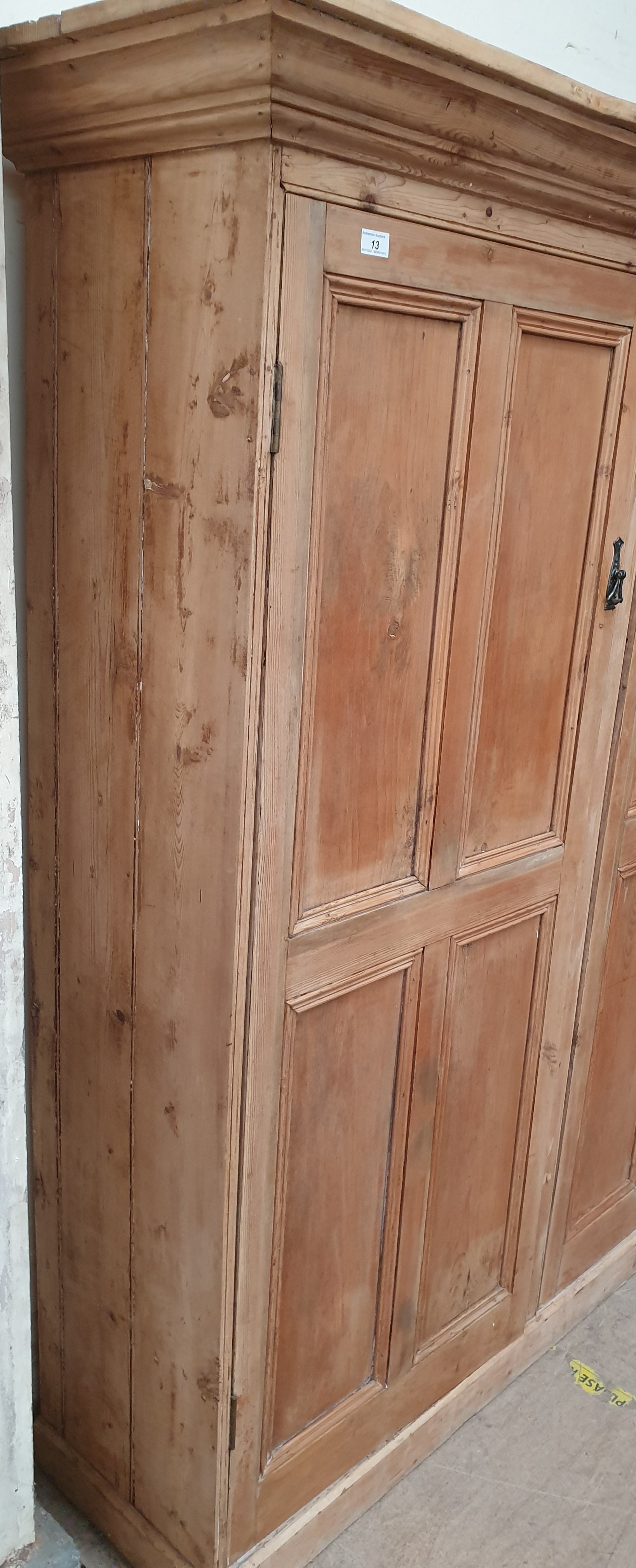 A large pine side cabinet with a moulded cornice above a pair of panelled cupboard doors on a - Image 3 of 6