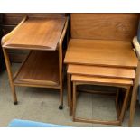 A teak tea trolley together with a teak nest of tables