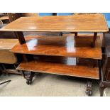 A Victorian mahogany three tier telescopic buffet on carved feet