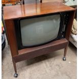 A Dynatron CTV29 televison contained within a tambour fronted case - Sold As Seen,