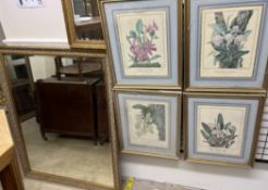 A large rectangular gilt wall mirror together with a small gilt wall mirror and four floral