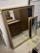 A large gilt framed wall mirror of rectangular form together with a smaller rectangular mirror