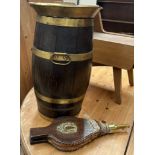 A brass and coopered barrel with twin handles together with an oak and brass bellows