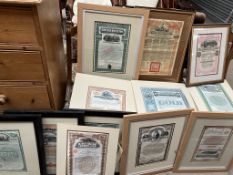 A collection of framed and unframed bonds including The Cleveland, Cincinnati,