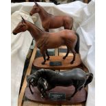 A Connoisseur model by Beswick of Black Beauty and Foal together with another of Red Rum and Arkle