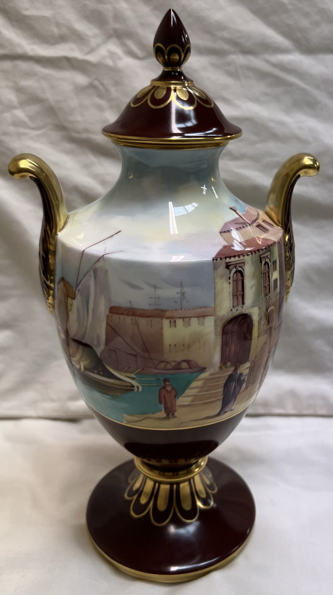A Caverswall porcelain twin handled vase and cover of a Venetian Harbour No.15 of 50, painted by R.