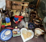 Copper lustre jugs together with a cased fish set,