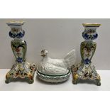 A pair of delft pottery candlesticks together with a pottery chicken and basket