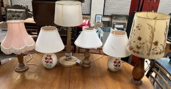 A collection of pottery and treen table lamps
