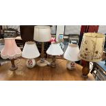 A collection of pottery and treen table lamps