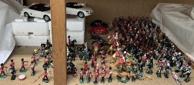 A large collection of lead soldiers mainly band players together with Corgi cars etc
