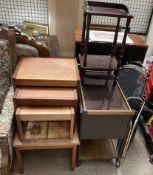 A mid 20th century tiled top table together with a nest of three tables, hostess trolley,