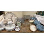 A floral moulded blue glass bowl together with part tea sets,