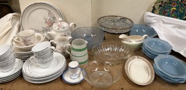 A floral moulded blue glass bowl together with part tea sets,